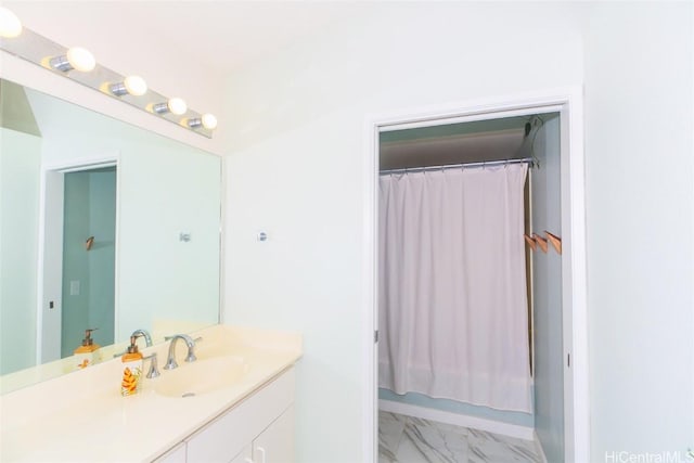 bathroom with vanity and shower / tub combo with curtain