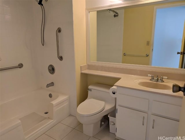 full bathroom featuring toilet, vanity, tile patterned floors, and tub / shower combination