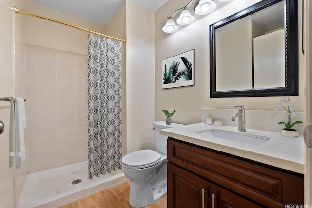 92-1150 Hame St Unit 8205, Kapolei, HI 96707 - bathroom featuring toilet, wood finished floors, a shower stall, and vanity