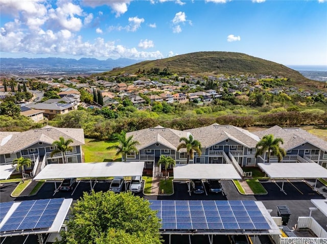 birds eye view of property with a mountain view