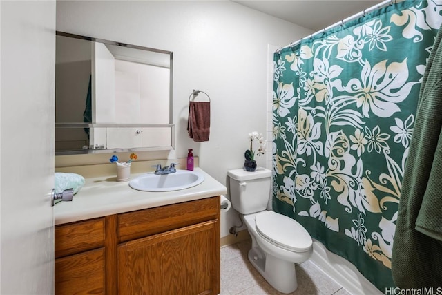 bathroom featuring toilet, a shower with shower curtain, vanity, and tile patterned floors