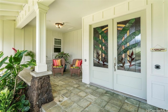 view of exterior entry featuring french doors