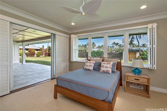 bedroom with ceiling fan, ornamental molding, access to outside, and multiple windows