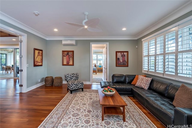 living room with a wealth of natural light, ornamental molding, and a wall mounted air conditioner