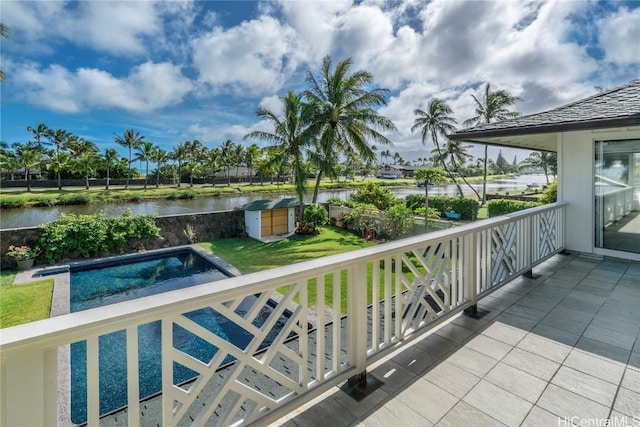 balcony featuring a water view