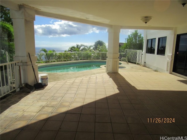 view of pool featuring a patio