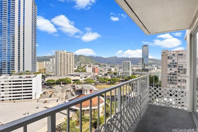 balcony featuring a mountain view