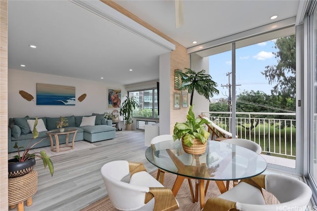 sunroom with a water view