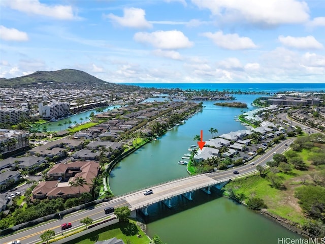 bird's eye view with a water and mountain view