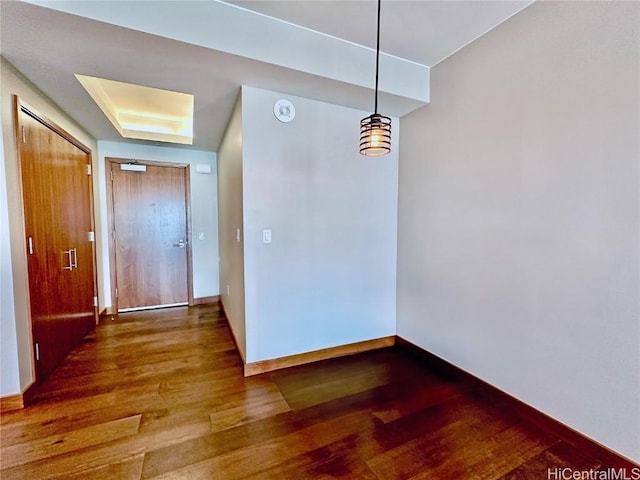 unfurnished dining area featuring hardwood / wood-style flooring