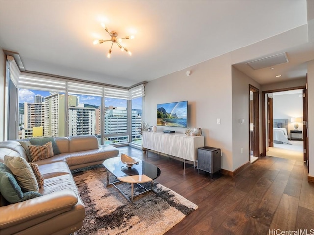 living area featuring a wall of windows, wood finished floors, and baseboards