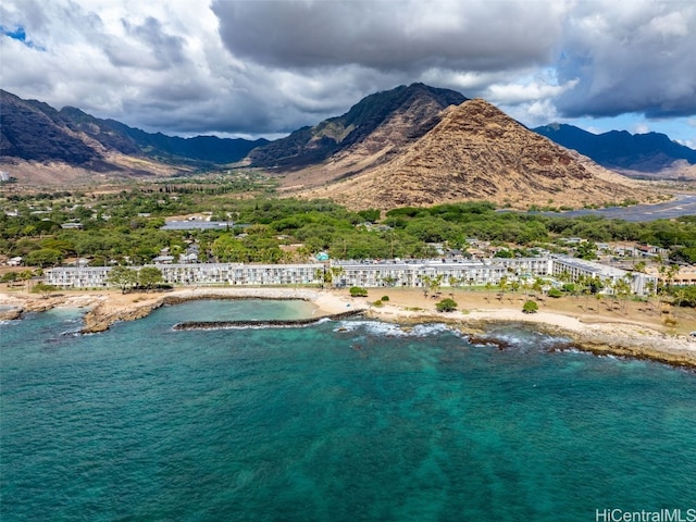 bird's eye view with a water and mountain view