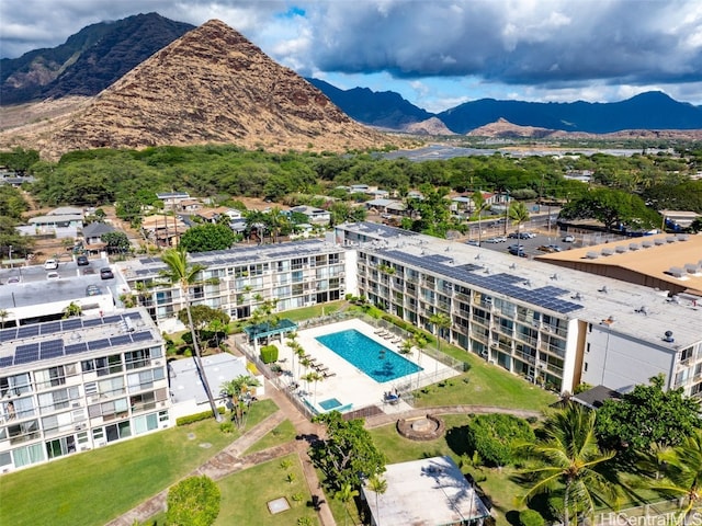 birds eye view of property featuring a mountain view