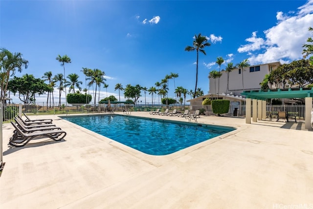 view of swimming pool featuring a patio area