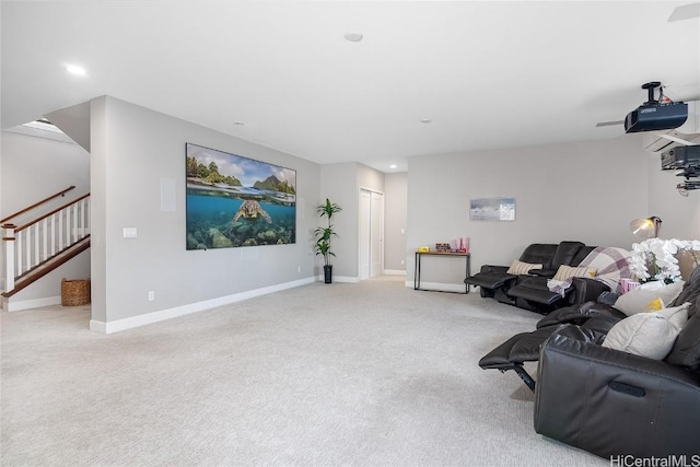 living room featuring light carpet, stairway, recessed lighting, and baseboards