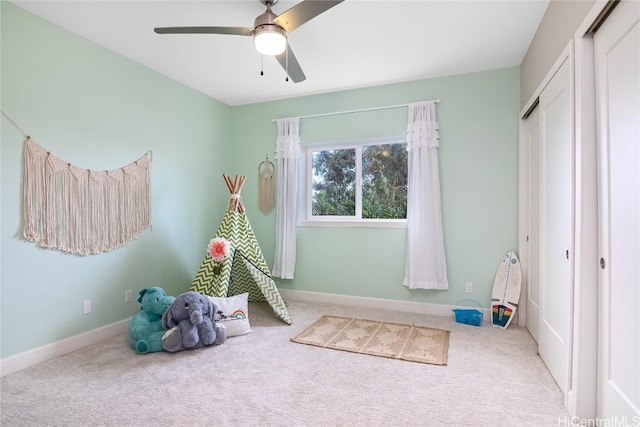 game room featuring ceiling fan and carpet floors