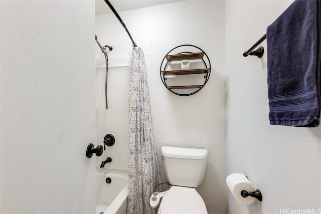 bathroom featuring toilet and shower / tub combo with curtain