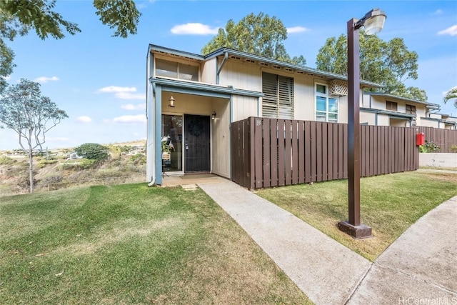 view of front of property with a front yard