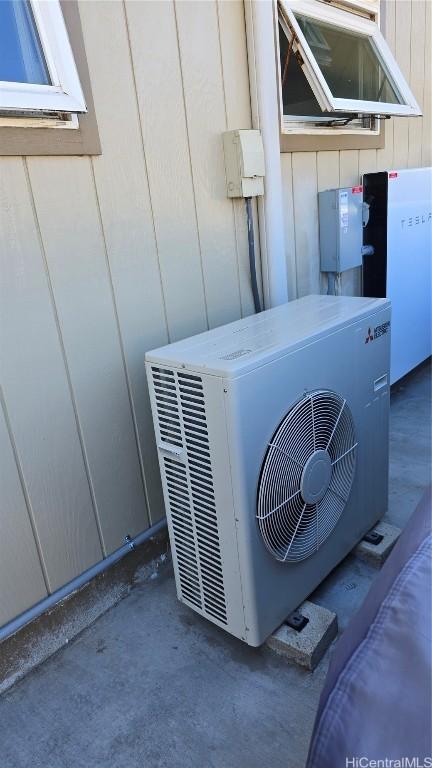 exterior details with white fridge and ac unit