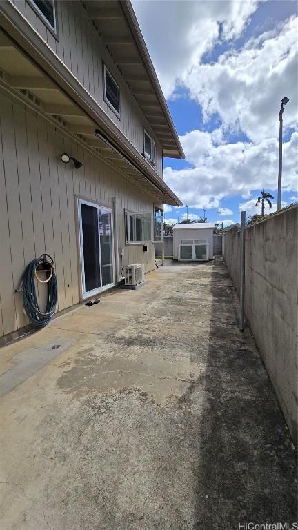 view of yard with central air condition unit