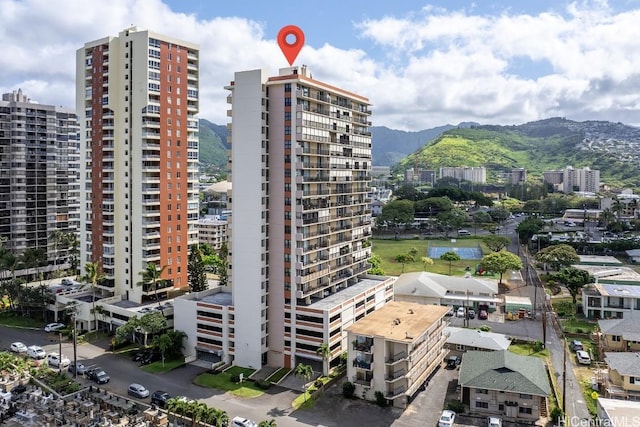 view of building exterior with a mountain view