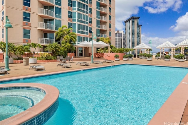 view of pool with a gazebo and a patio