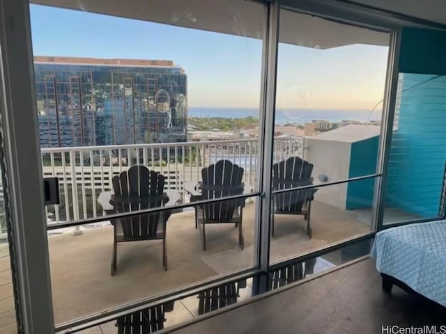 view of balcony at dusk