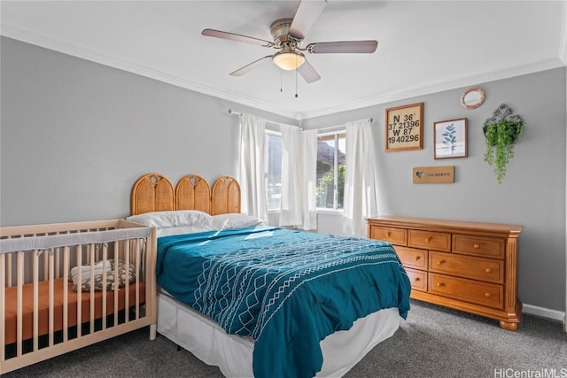 carpeted bedroom featuring crown molding and ceiling fan