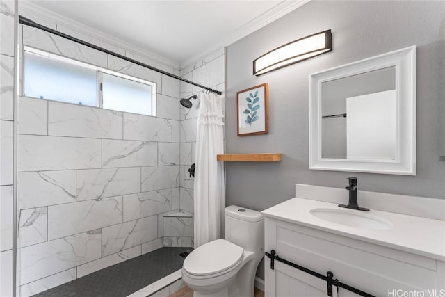 bathroom with vanity, toilet, ornamental molding, and a shower with shower curtain