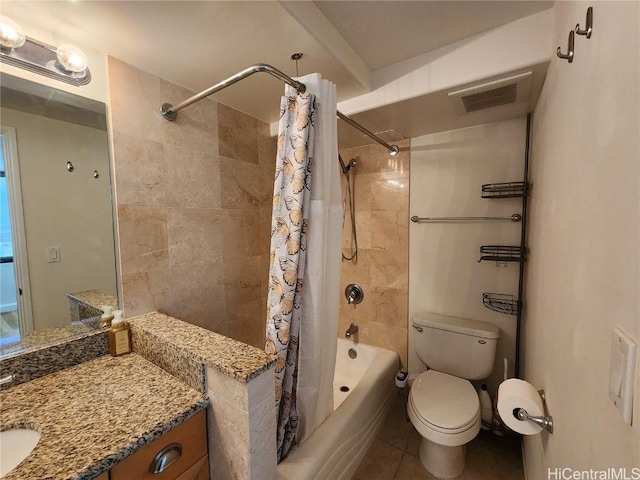 full bathroom featuring tile patterned flooring, vanity, shower / tub combo, and toilet