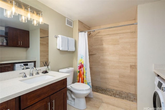 bathroom featuring vanity, toilet, a shower with shower curtain, and washer / dryer