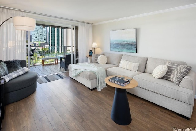 living room featuring dark hardwood / wood-style flooring, a wall of windows, and crown molding