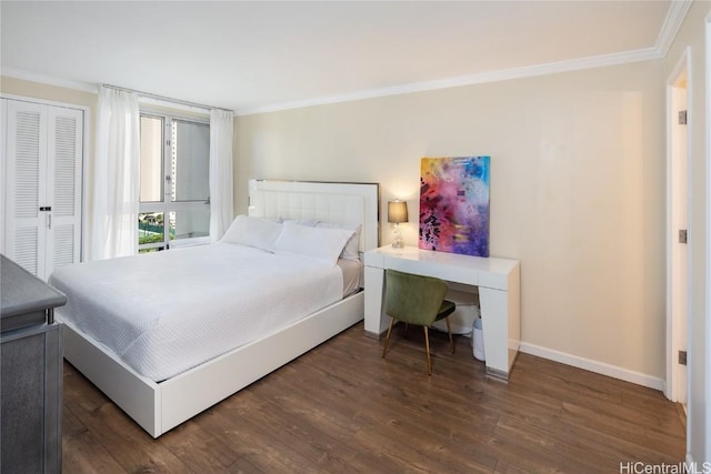 bedroom featuring a closet, crown molding, and dark hardwood / wood-style flooring