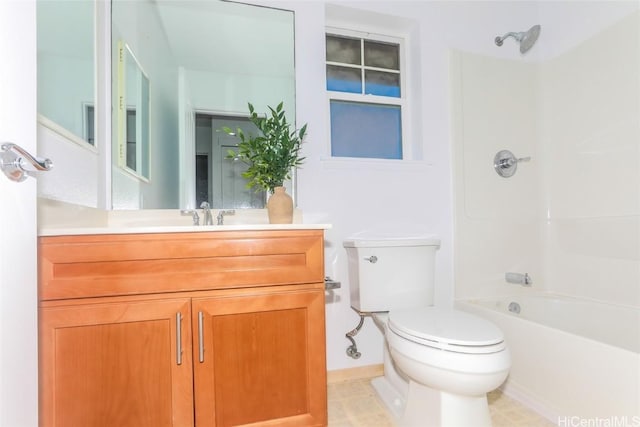 full bathroom featuring vanity, bathtub / shower combination, and toilet