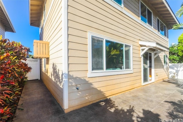 view of property exterior featuring a patio area