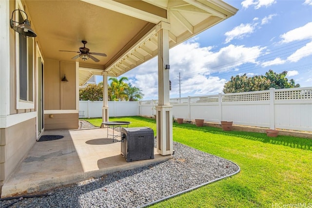 view of patio featuring ceiling fan