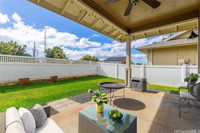 view of patio with ceiling fan