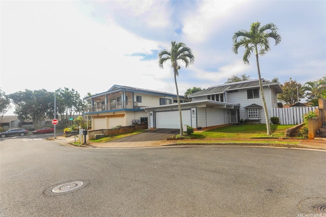 94-15 Kaweo Pl, Mililani, HI 96789 - view of front facade featuring asphalt driveway and a garage