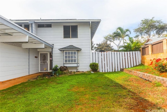 exterior space featuring a yard