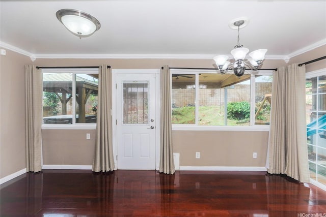 94-15 Kaweo Pl, Mililani, HI 96789 - unfurnished dining area featuring a chandelier, ornamental molding, and wood finished floors