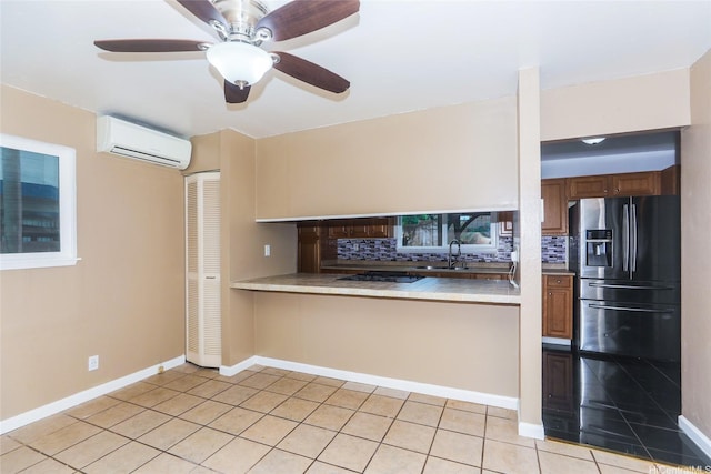 94-15 Kaweo Pl, Mililani, HI 96789 - kitchen featuring a wall mounted air conditioner, refrigerator with ice dispenser, decorative backsplash, and light tile patterned flooring