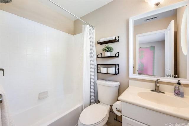 bathroom with toilet, visible vents, shower / tub combo with curtain, and vanity