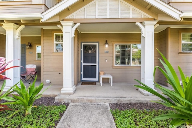 property entrance featuring a porch