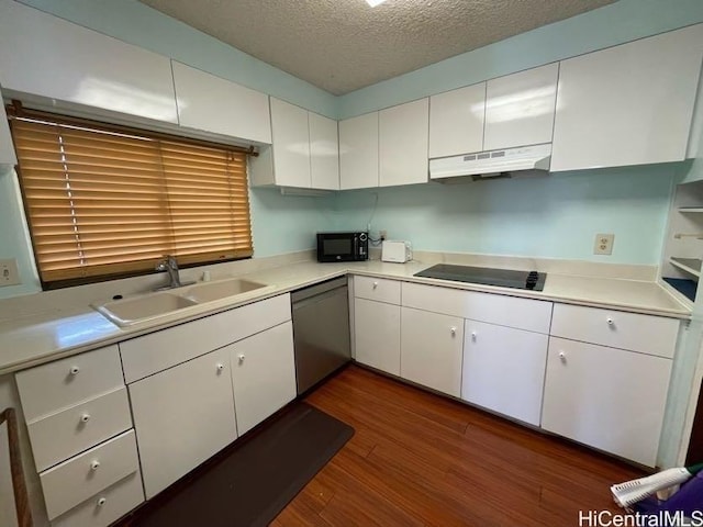 kitchen with sink, a textured ceiling, white cabinetry, dark hardwood / wood-style flooring, and black appliances