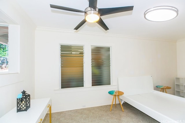 carpeted bedroom with ornamental molding