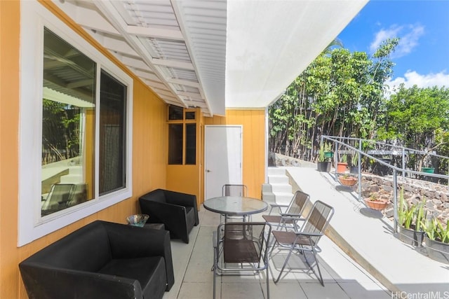 view of patio featuring outdoor dining area