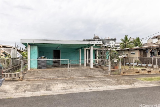 view of front of house with a carport