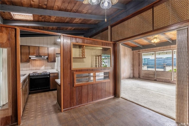 kitchen with ceiling fan, wooden ceiling, electric range oven, vaulted ceiling with beams, and wooden walls