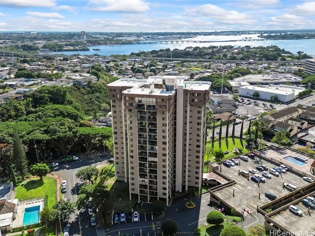 drone / aerial view with a water view