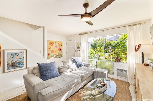 living room with ceiling fan, a wall mounted air conditioner, and light tile patterned floors